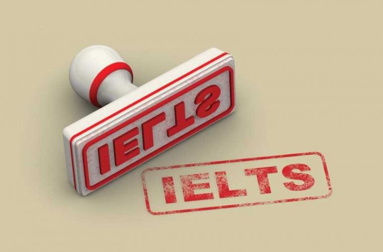 Red seal and imprint "IELTS" on white surface